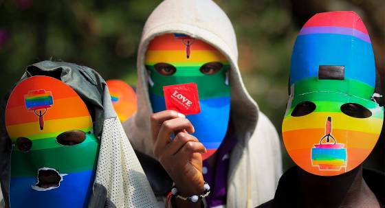 Kenyan supporters of the LGBTQIA+ protest against a Ugandan anti-gay bill in 2014 (Image: AAP/EPA/Dai Kurokawa)