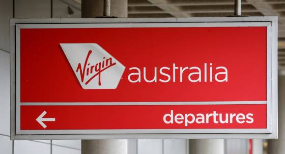 Virgin Australia signage at Brisbane Domestic Airport (Image: AAP/Russell Freeman)