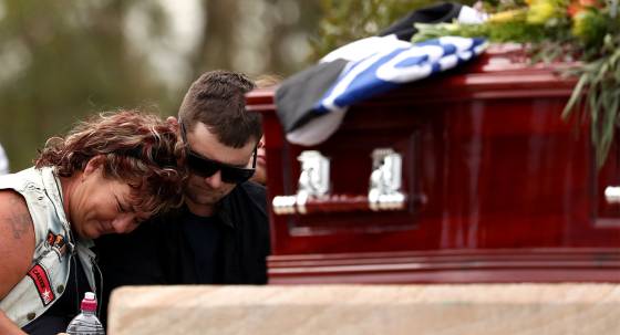 Kerry Dare and stepson Corey Richards at the funeral for Alan Dare (Image: AAP/Jason O'Brien)