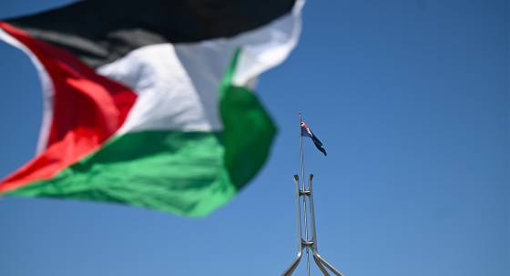 A Palestinian flag in front of Parliament House (Image: AAP/Lukas Coch)