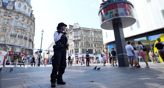A Police officer stands at the scene of a stabbing in London (Image: AP/James Manning)